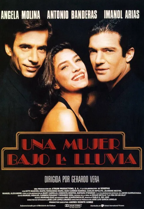 Plakat: Una mujer bajo la lluvia
